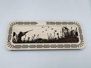 Hunting themed engraving on a three-track cribbage board