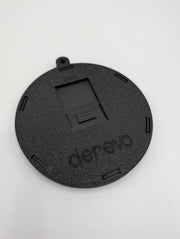 Black back of the One More Hand cribbage ornament with the storage door closed and recessed Derevo logo.
