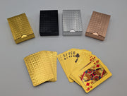 Gold waterproof PET plastic playing cards with embossed foil, showing card faces, patterned backs, and the four colour options