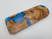 Azure Cove Origin Turkish olivewood cribbage board with bright blue resin — reverse side.