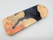 Ember Current Origin Manitoba maple burl cribbage board with smoky midnight blue resin — reverse side.