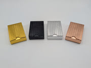 Waterproof PET playing-card decks in gold, black, silver, and rose gold patterned boxes