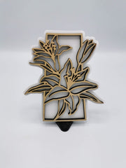 Saskatchewan lily sign in maple over white