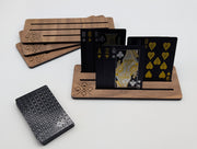 Walnut playing card holders with three slots, one holding cards to show use; playing cards sold separately